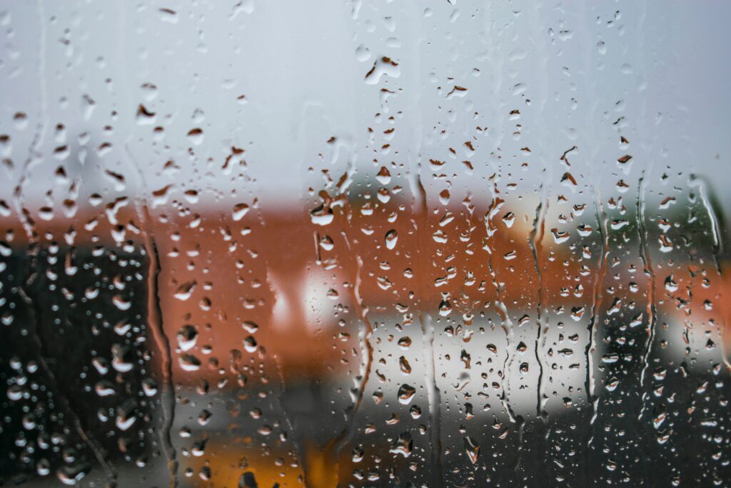 Stunning Water Droplets on Glass Wallpaper Background