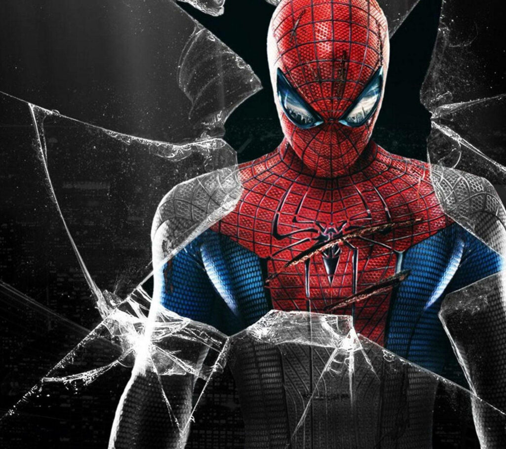 Shattered Tech: Marvel's Spectacular Spider-Man Concealed Behind a Cracked Computer Display Wallpaper