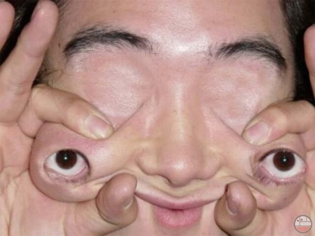 Weird Filthy Frank meme wallpaper distorted close-up face pulling surreal funny expression background