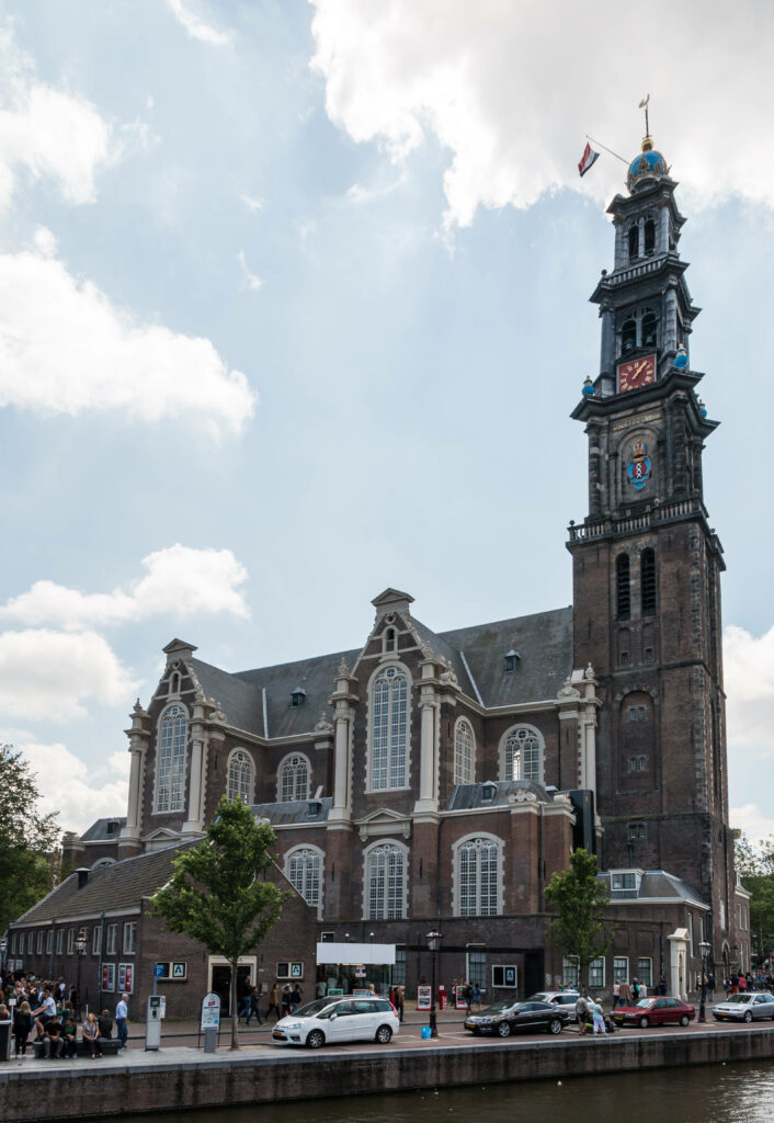 Daytime Westerkerk Wallpaper: Iconic Amsterdam Architecture Scene