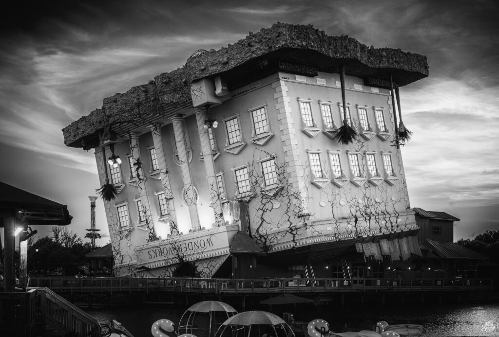 Whimsical Black and White Wallpaper: Upside-Down Building Design
