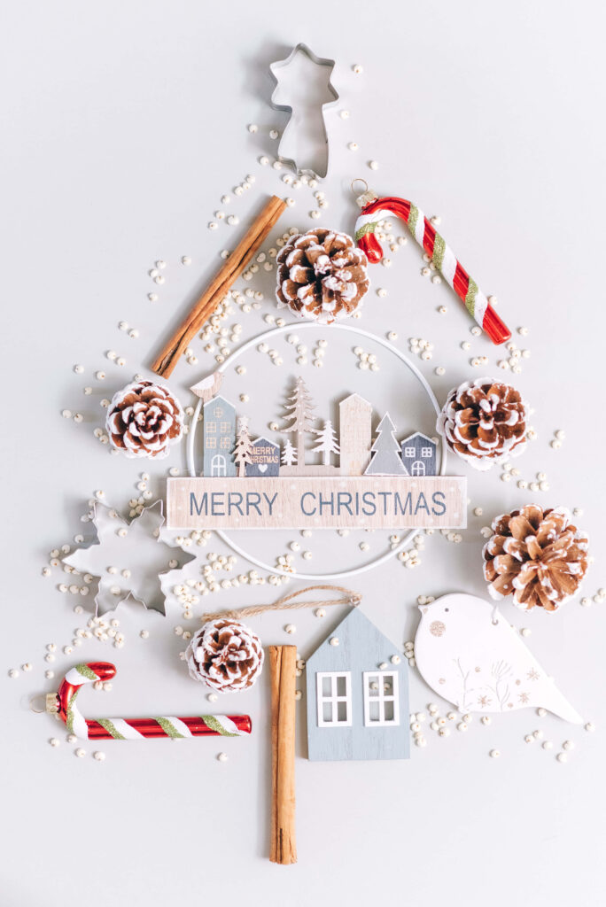 Whimsical Christmas Tree Wallpaper with Cozy Festive Elements