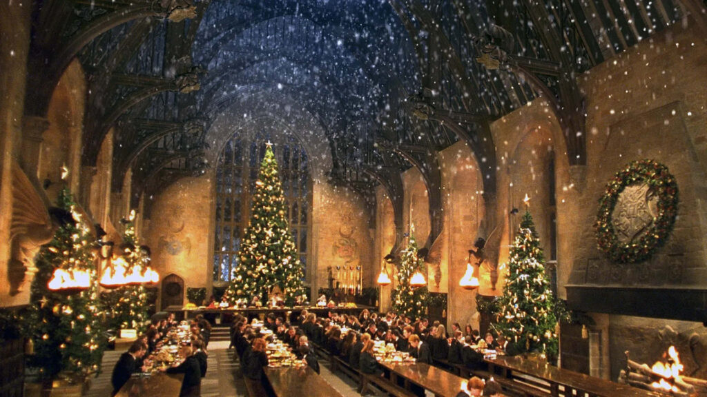 Enchanting Christmas Hall: Sparkling Trees & Cozy Festive Feast Wallpaper