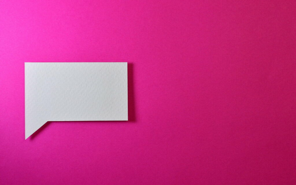 Captivating Communication: Exploring Insights through Pink Speech Bubbles and Paper Notes on HD Wallpaper Background
