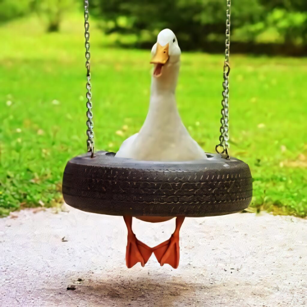 Cheerful Goose on Tire Swing Wallpaper – Whimsical Green Background