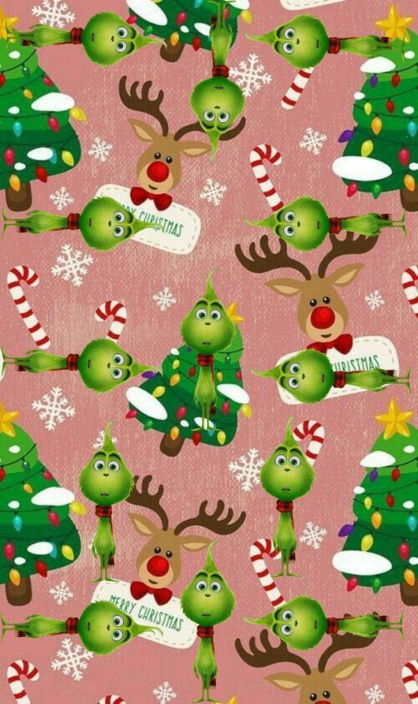 Whimsical Grinch Christmas wallpaper with reindeer trees candy canes on soft pink background