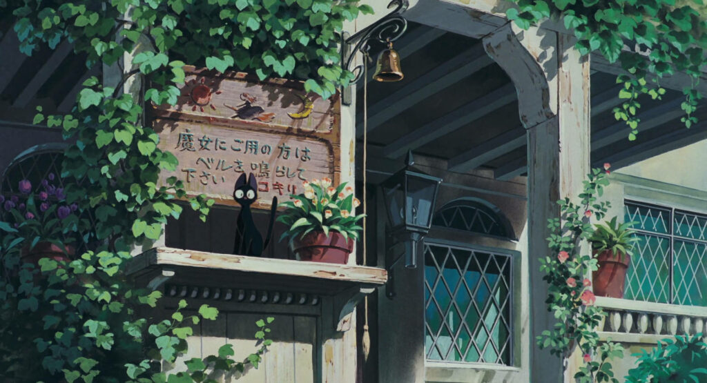 Charming Jiji Wallpaper: Cozy Balcony with Greenery & Whimsical Vibes