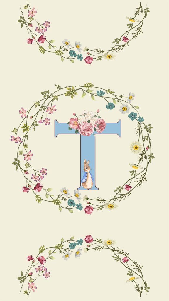 Peter Rabbit nursery wallpaper light blue letter T with watercolor roses floral wreath cream background