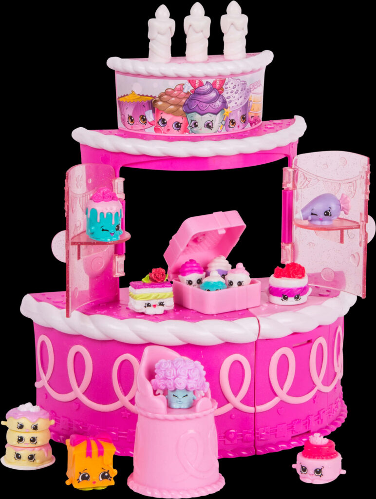 Vibrant Pink Multi-Tiered Toy Birthday Cake Wallpaper - Festive Fun!