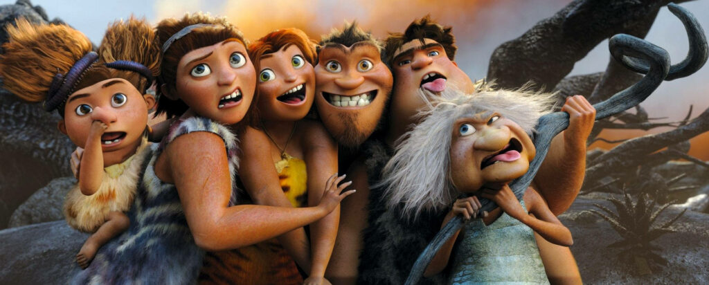 Colorful Croods Wallpaper: Playful Family Adventure Scene