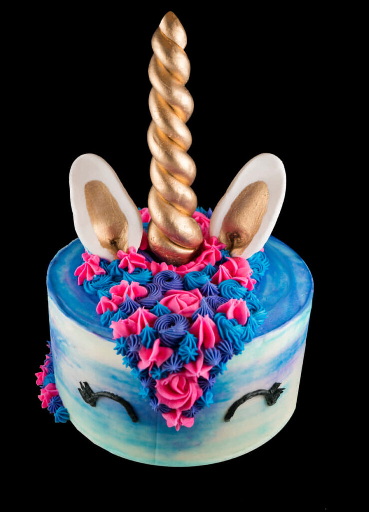 Whimsical Unicorn Cake with Floral Icing - Magical Wallpaper