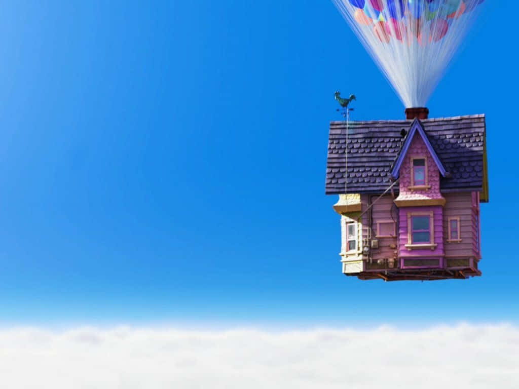 Whimsical Up House Wallpaper with Colorful Balloons in Blue Sky