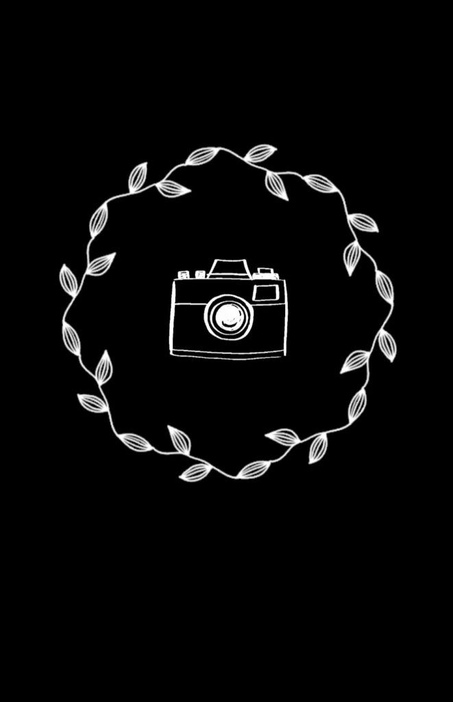 Minimalist white line-art camera in leafy wreath on black background digital wallpaper cover
