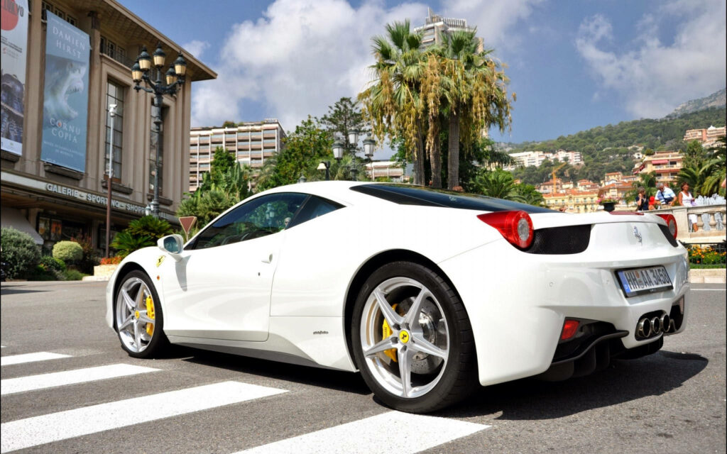 White Ferrari in a Tropical Urban Wonderland Wallpaper