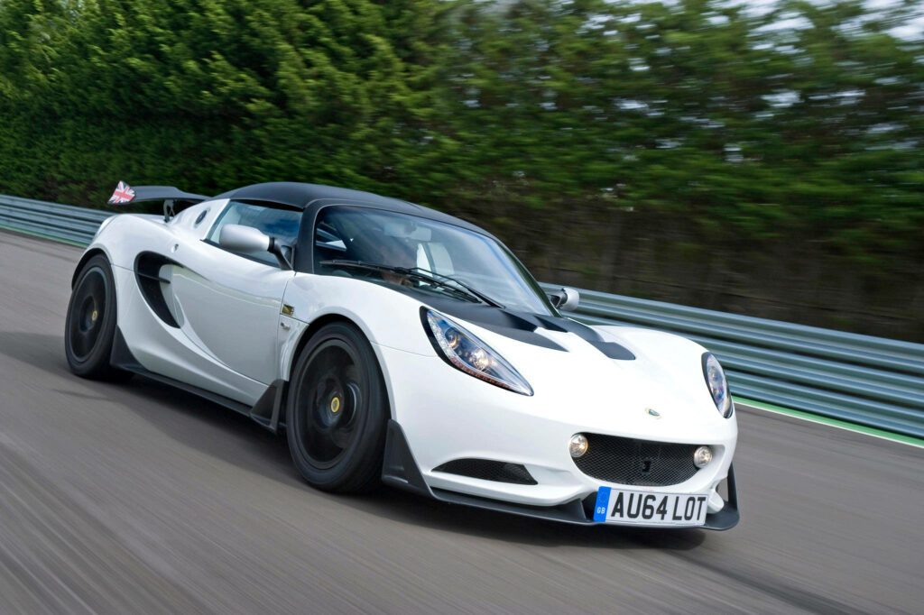White Lotus Elise Cup 250 racing on track with aerodynamic design and sporty black accents Wallpaper