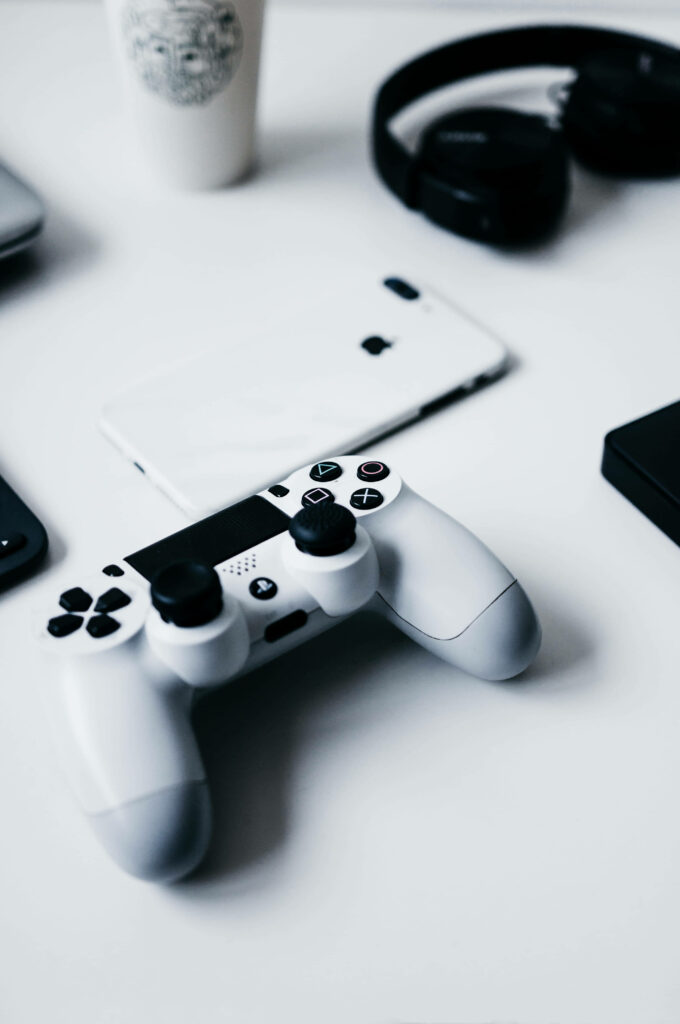 White Minimalist Tech Setup Wallpaper: Gadgets on Clean Surface