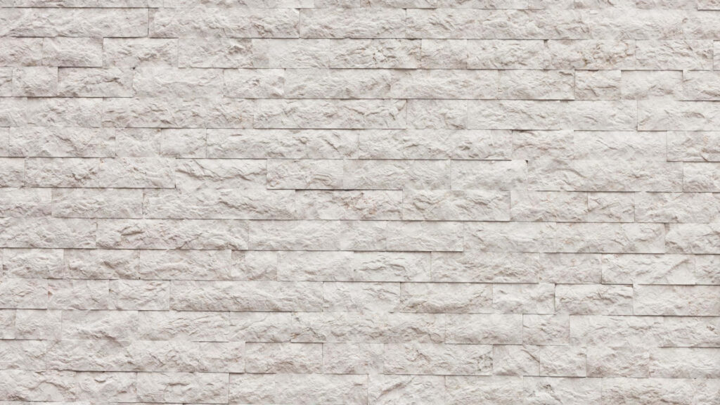 Modern White Stone Brick Wall Texture for Sleek Design Projects Wallpaper