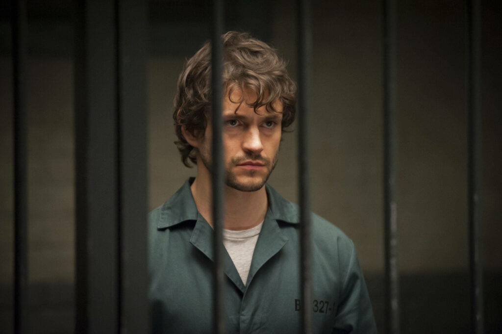 Will Graham Behind Bars: Emotional Hannibal Wallpaper Background
