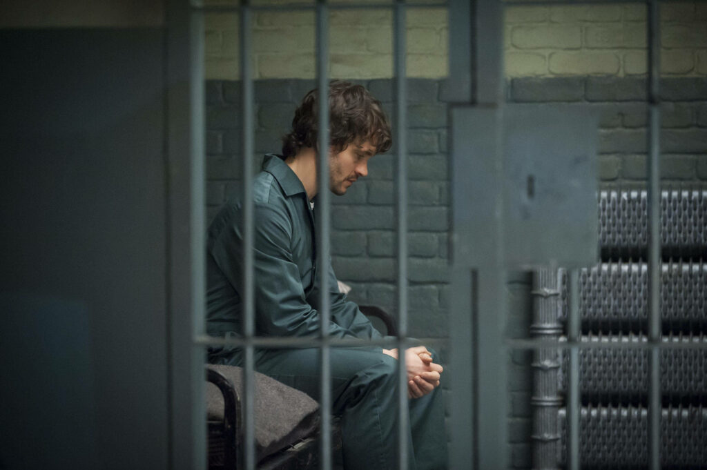 Will Graham's Contemplative Moment Behind Bars - Hannibal Wallpaper