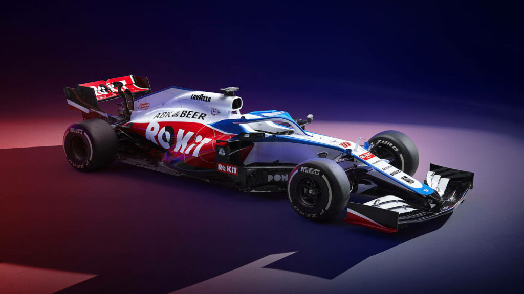 Williams Racing car with bold livery under dynamic lighting highlighting aerodynamics and sponsors Wallpaper