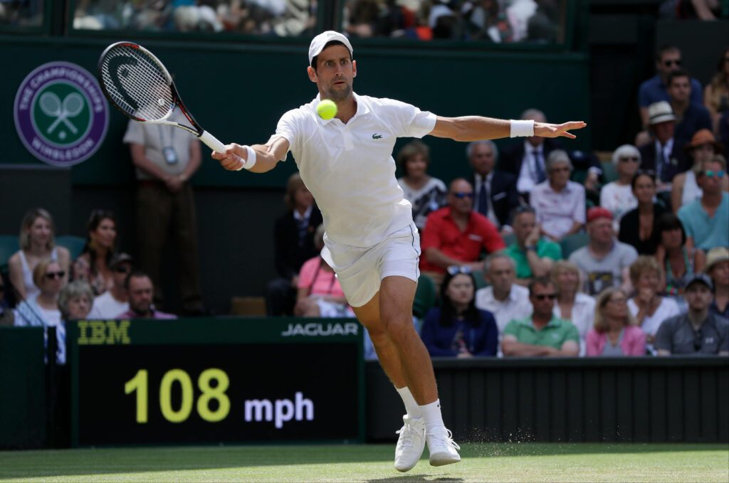Novak Djokovic Wimbledon 2021: Agile Tennis Action Wallpaper Background