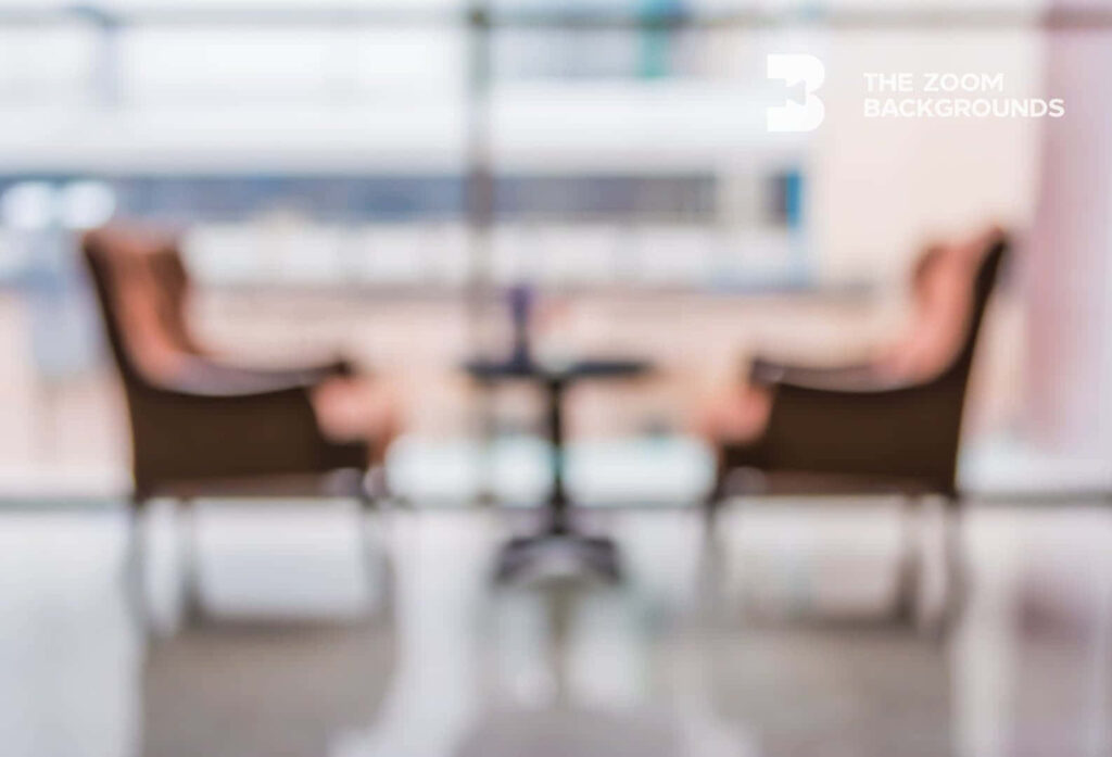 Blurred professional Zoom background with armchairs and bright window for calm virtual meetings Wallpaper