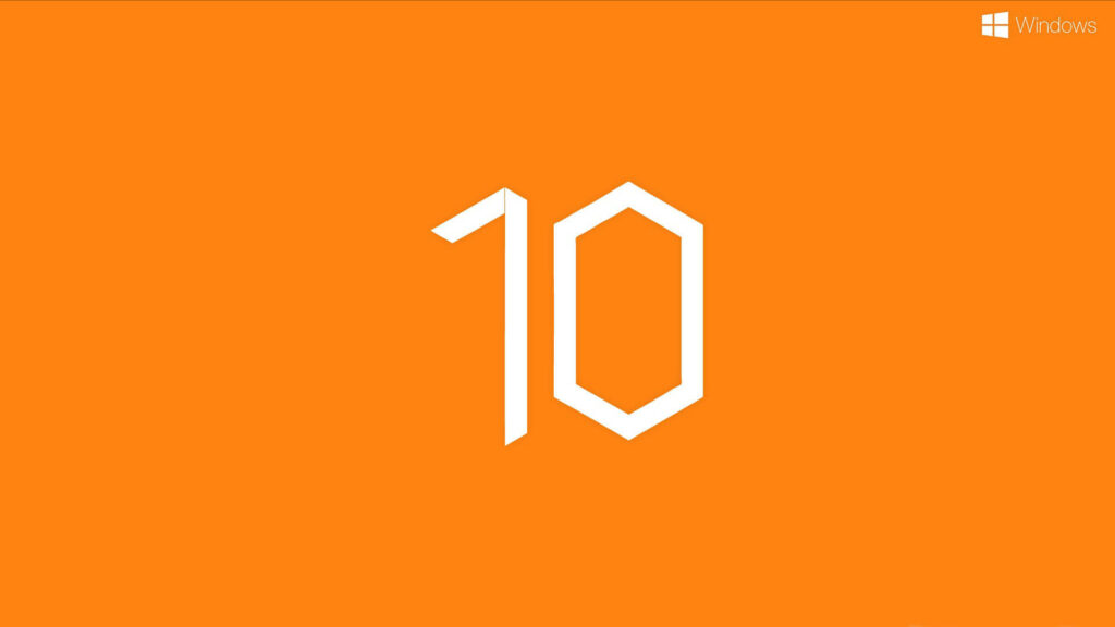 The Bright Future of Microsoft: Windows 10 Conceptual Logo Shines in Vibrant Orange - A Captivating Microsoft Desktop Background Wallpaper