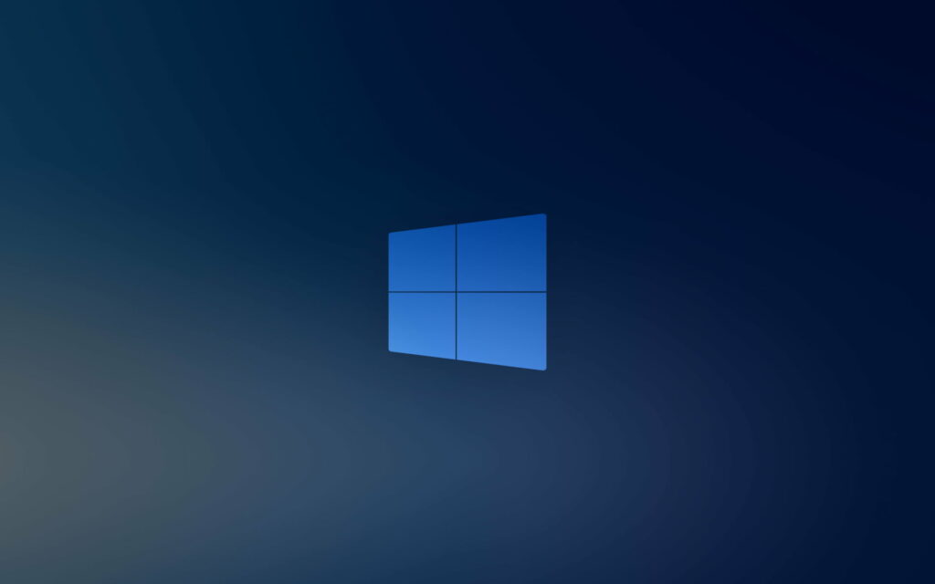 Minimalist Windows logo wallpaper with deep blue gradient background for modern desktops