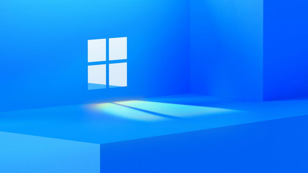 Windows 11: Vibrant Blue Logo in Stunning HD - A Captivating Wallpaper for Your Background