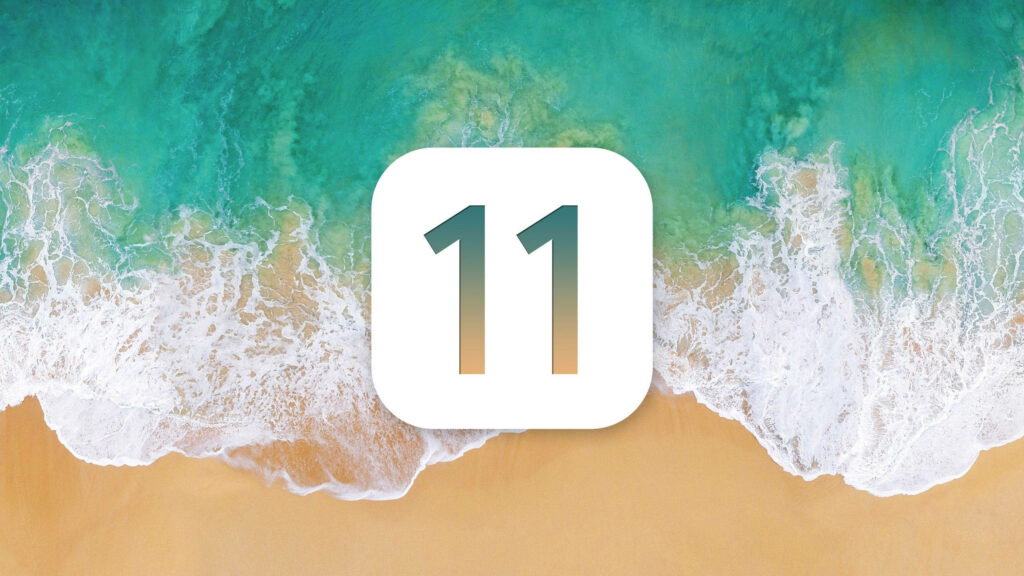 Aerial view of turquoise ocean waves and white foam with minimalist white 11 icon wallpaper