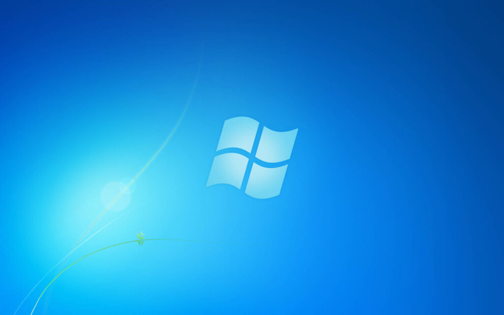 Vibrant Windows 7 Blue Background with Iconic Logo Wallpaper