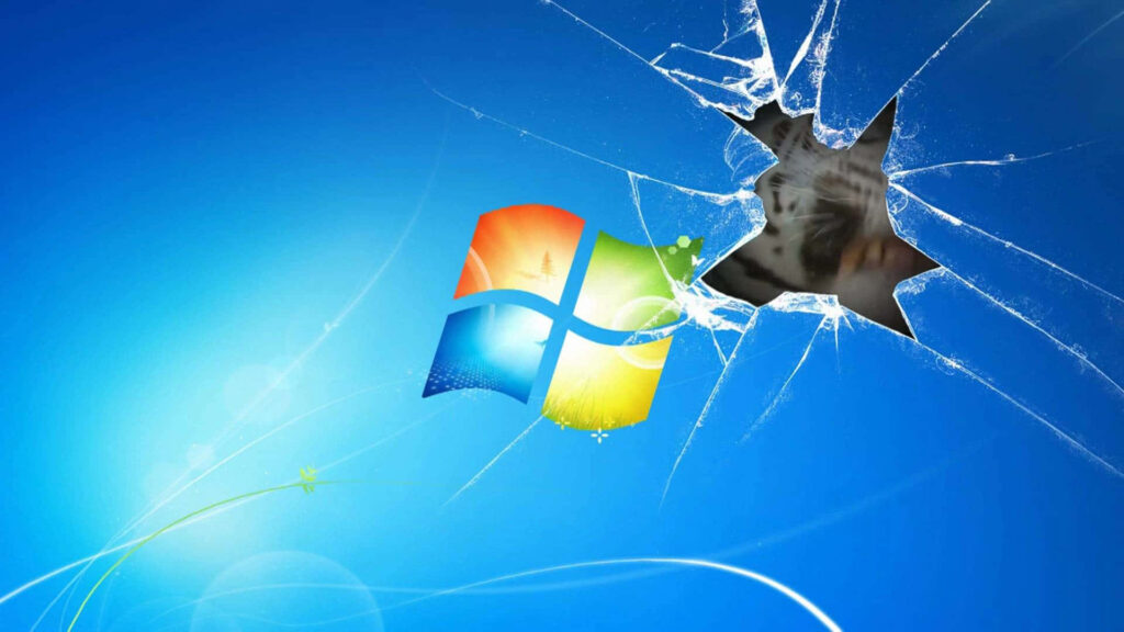 Windows 7 HD wallpaper vivid blue background with iconic logo and realistic broken screen effect