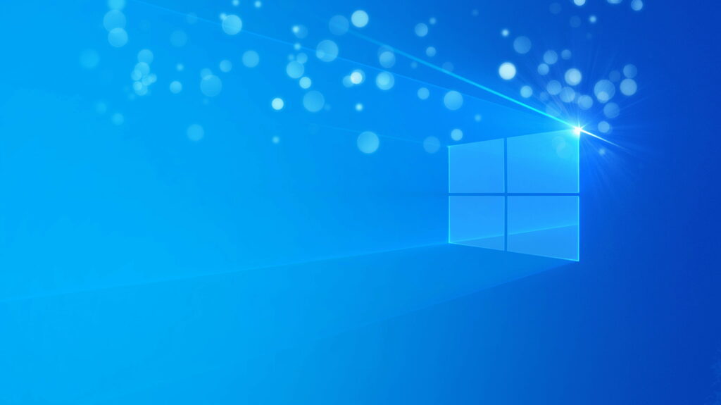 Windows Hero logo glowing with radiant light flare on sleek blue abstract digital wallpaper background