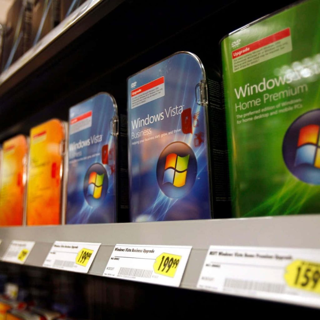 Retail shelf with Microsoft Windows Vista Business and Home Premium software boxes and price tags Wallpaper