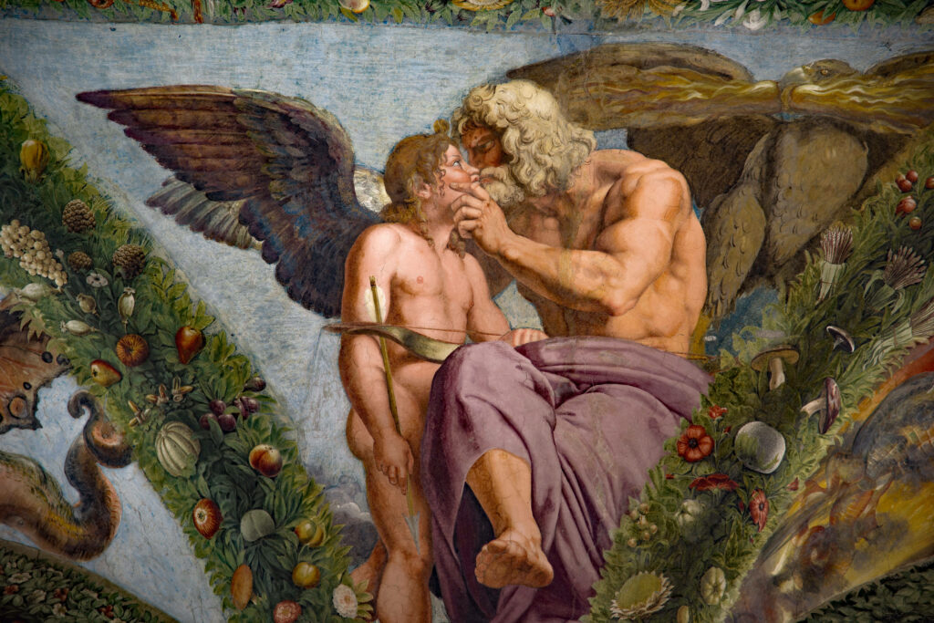 A Winged Son Engages in a Thought-Provoking Conversation with His Renaissance Father Wallpaper