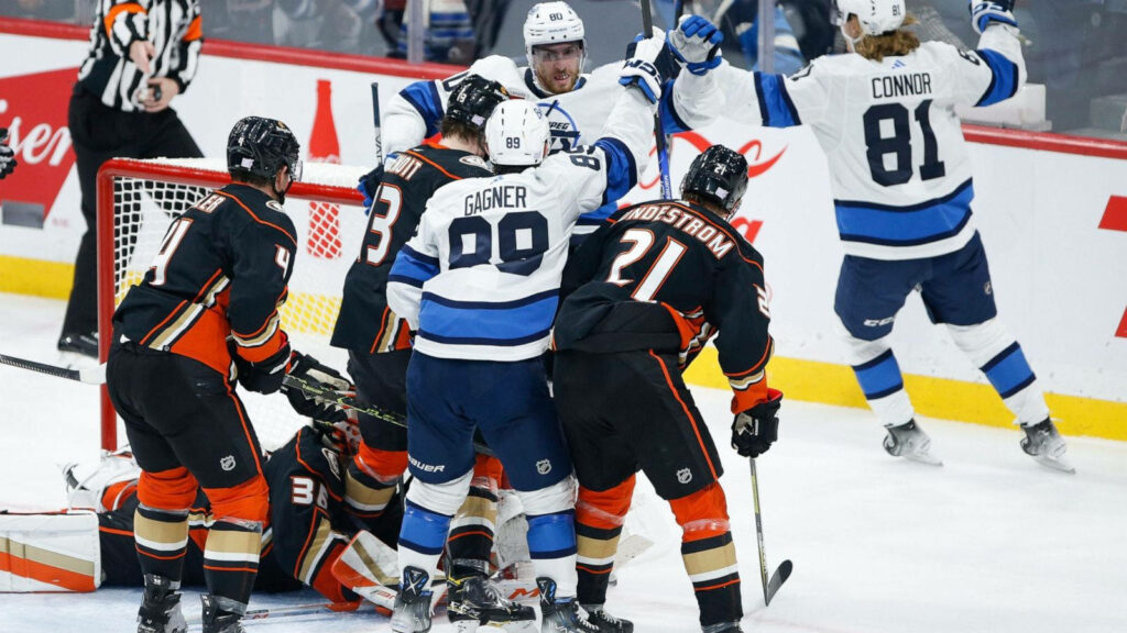 Winnipeg Jets Celebration Wallpaper: Kyle Connor vs. Anaheim Ducks