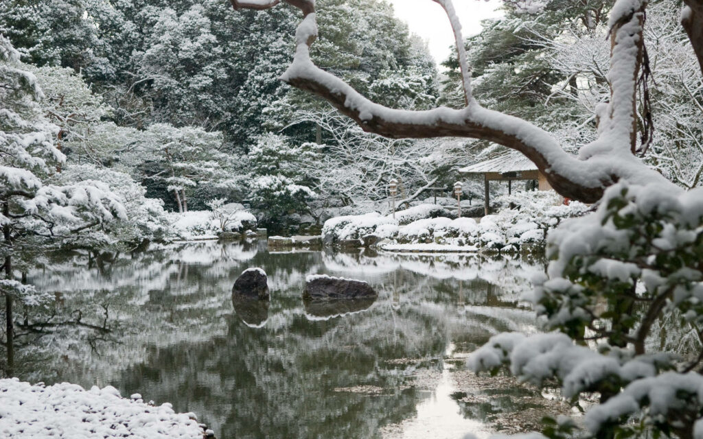Winter Wonderland: The Enchanting Heian Shrine Amidst Snowy Serenity Wallpaper