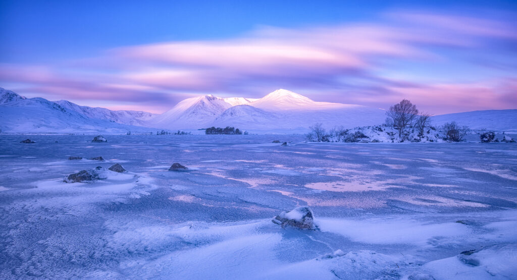 Snow-covered Rannoch Moor and Loch Lomond Scottish winter landscape with pink blue sky Wallpaper