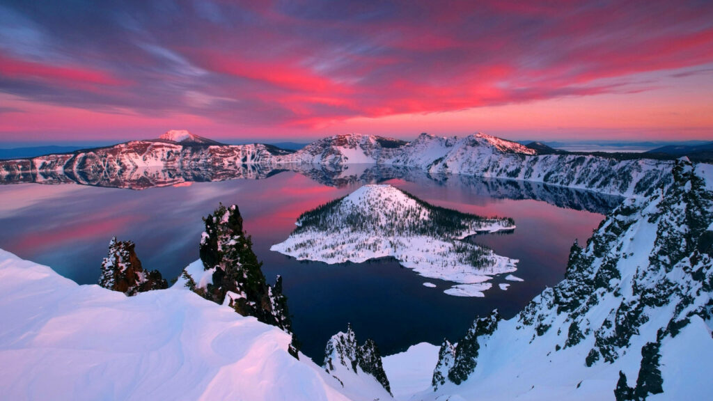 Winter Magic: Enchanting Crater Lake, Oregon - Nature's Wonderland in a Rosy Winter Glow Wallpaper