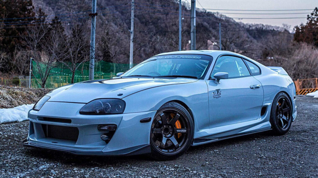 Wintry Bliss: Stunning Light Blue Toyota Supra Wallpaper