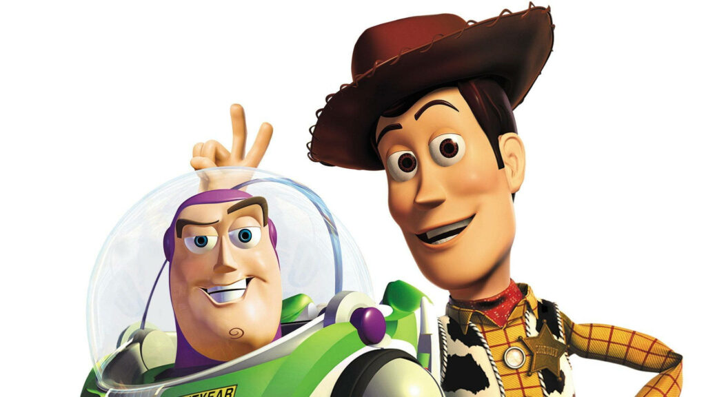 Woody playfully gives Buzz Lightyear bunny ears in a fun Toy Story friendship photo wallpaper