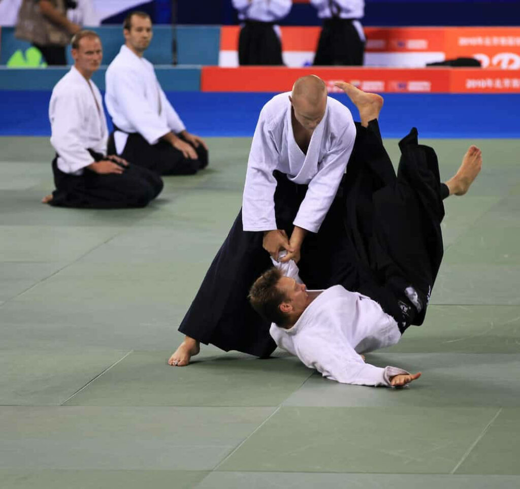 World Combat Games Aikido Competition intense fluid martial arts techniques in action wallpaper