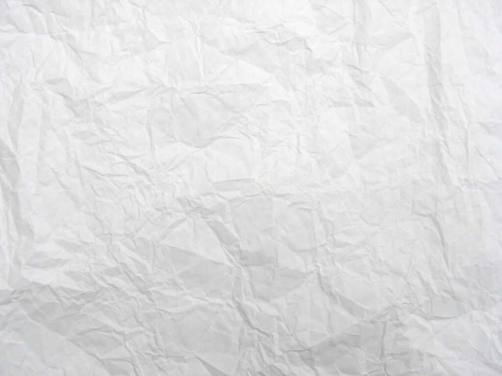 Texture Tales: A White Printed Paper Adventure on Crumpled & Wrinkled Backgrounds Wallpaper