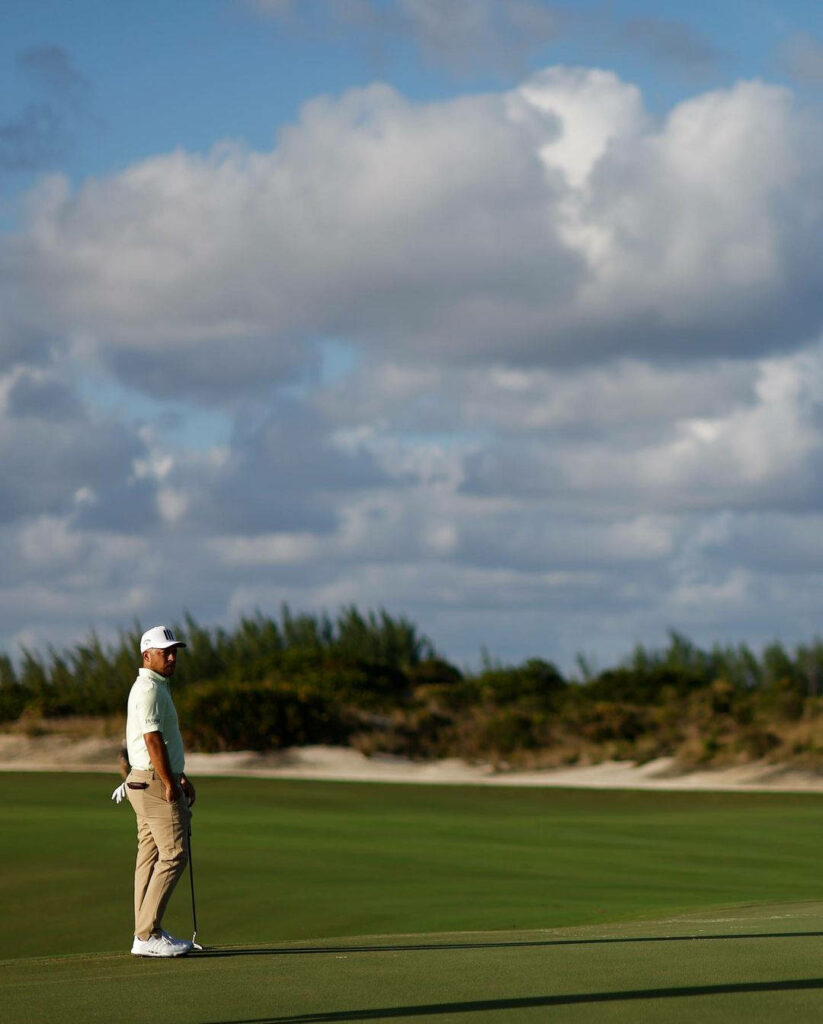 Tranquil Golf Course Wallpaper: Xander Schauffele Under Vibrant Sky