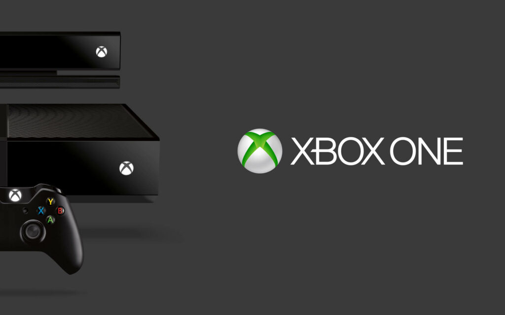 Xbox One X: A Gamer's Dream Wallpaper with Console, Controller, and Logo