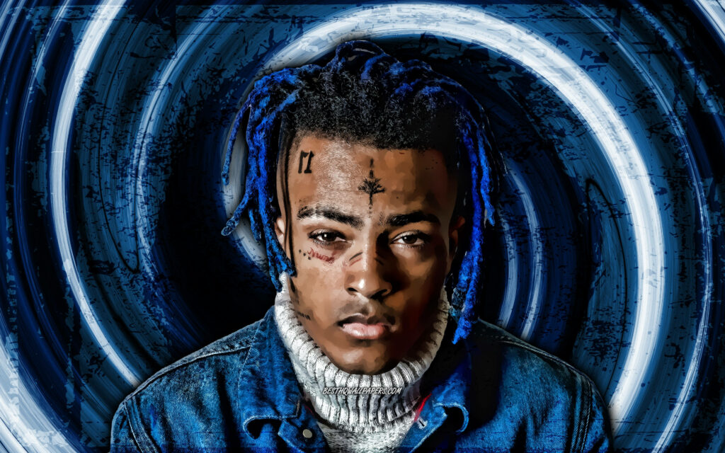 Mesmerizing Xxxtentacion: An Enigmatic Computer Background with a Hypnotic Blue and White Spiral Wallpaper