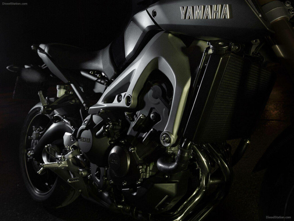 Yamaha MT-15 Engine: Close-Up of Power & Design - Wallpaper