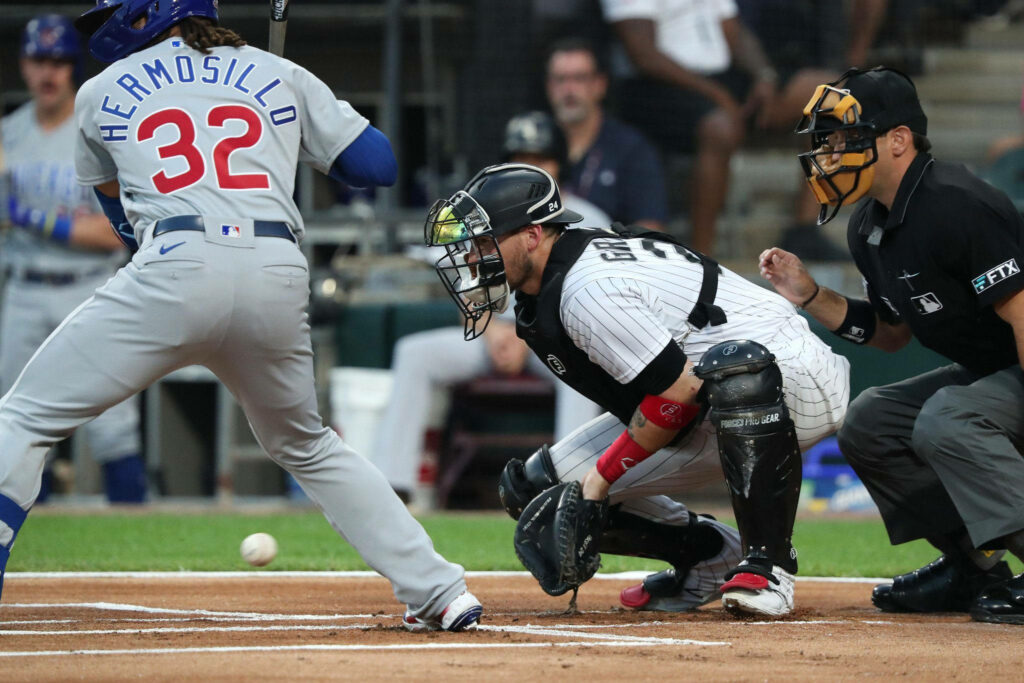 Yasmani Grandal: Intense Catcher Action Wallpaper Background