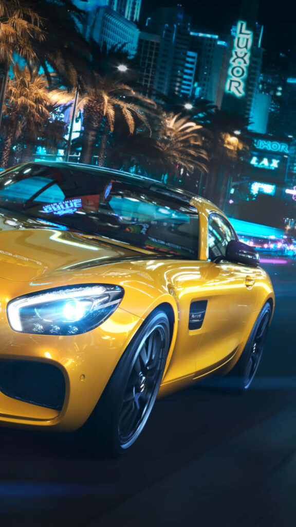 Yellow AMG GT-R speeding through neon city night with palm trees and glowing skyscrapers Wallpaper
