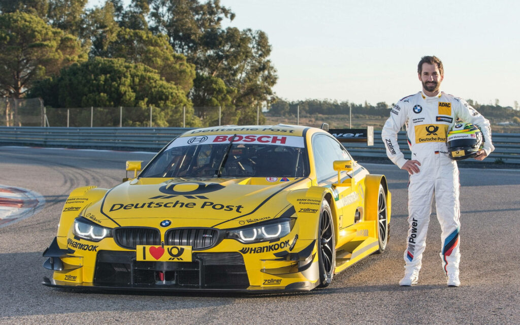 The Roaring Yellow BMW M4 DTM Speed Demon: A Captivating Snapshot of Power and Performance Wallpaper